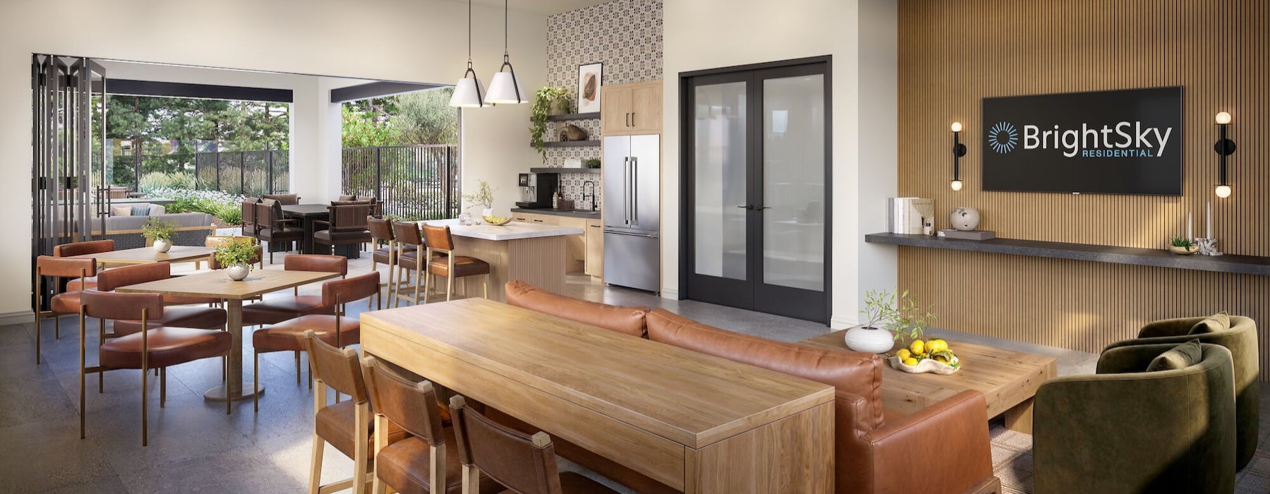 a lounge with a couch, tables and chairs